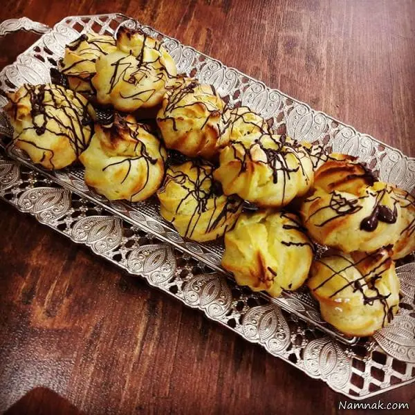 طرز تهیه نان خامه ای با نکات ریز شیرینی خوشمزه