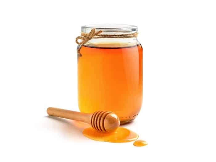 عسل برای درمان آکنه چرکی عسل