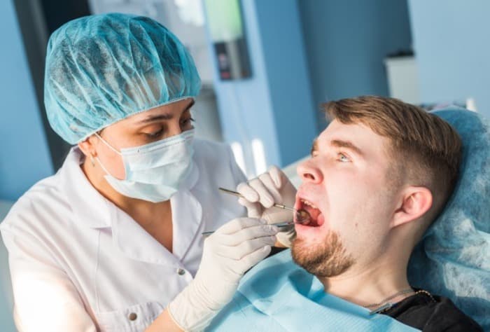دلایل کشیدن دندان