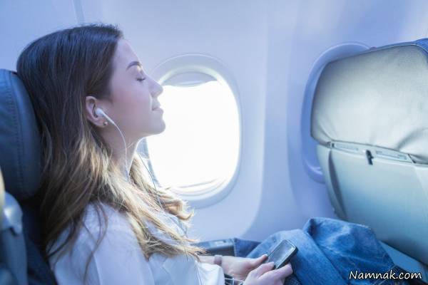 9 ترفند برای رفع مشکل خوابیدن در هواپیما 1