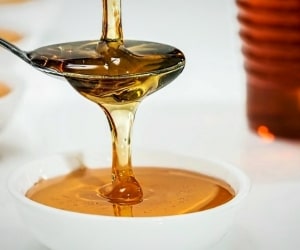 راه تشخیص عسل طبیعی از تقلبی