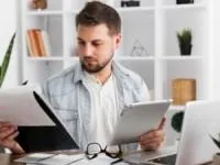 به تعویق انداختن کارها