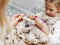 علائم تب کودک