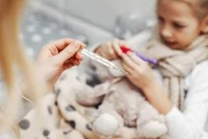 علائم تب کودک