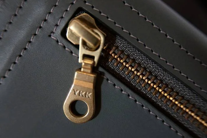 معنی YKK