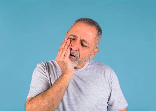 علل لق شدن دندان
