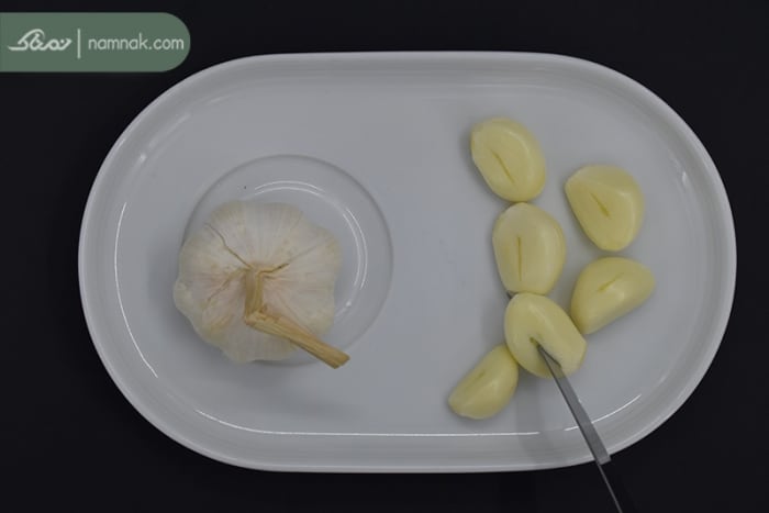 برش زدن سیر برای ترشی برش زدن سیر