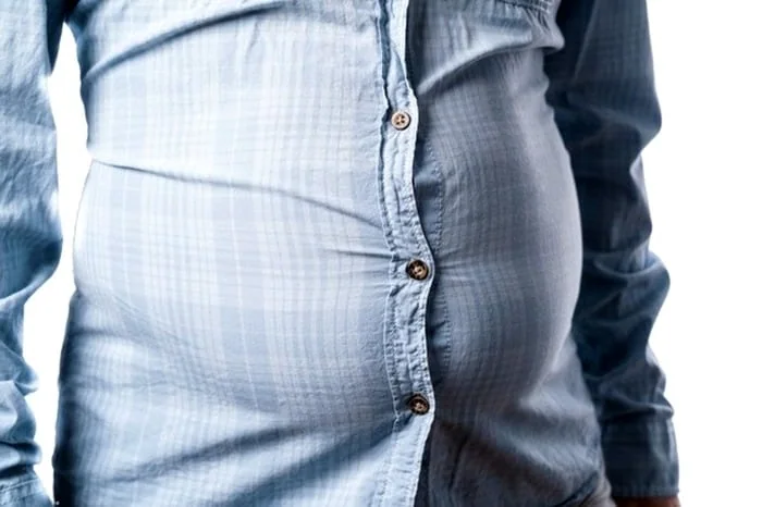 عوارض مصرف زیاد برنج سفید چربی شکم